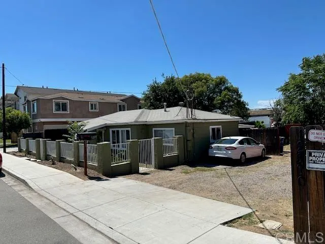 a car parked in front of a house