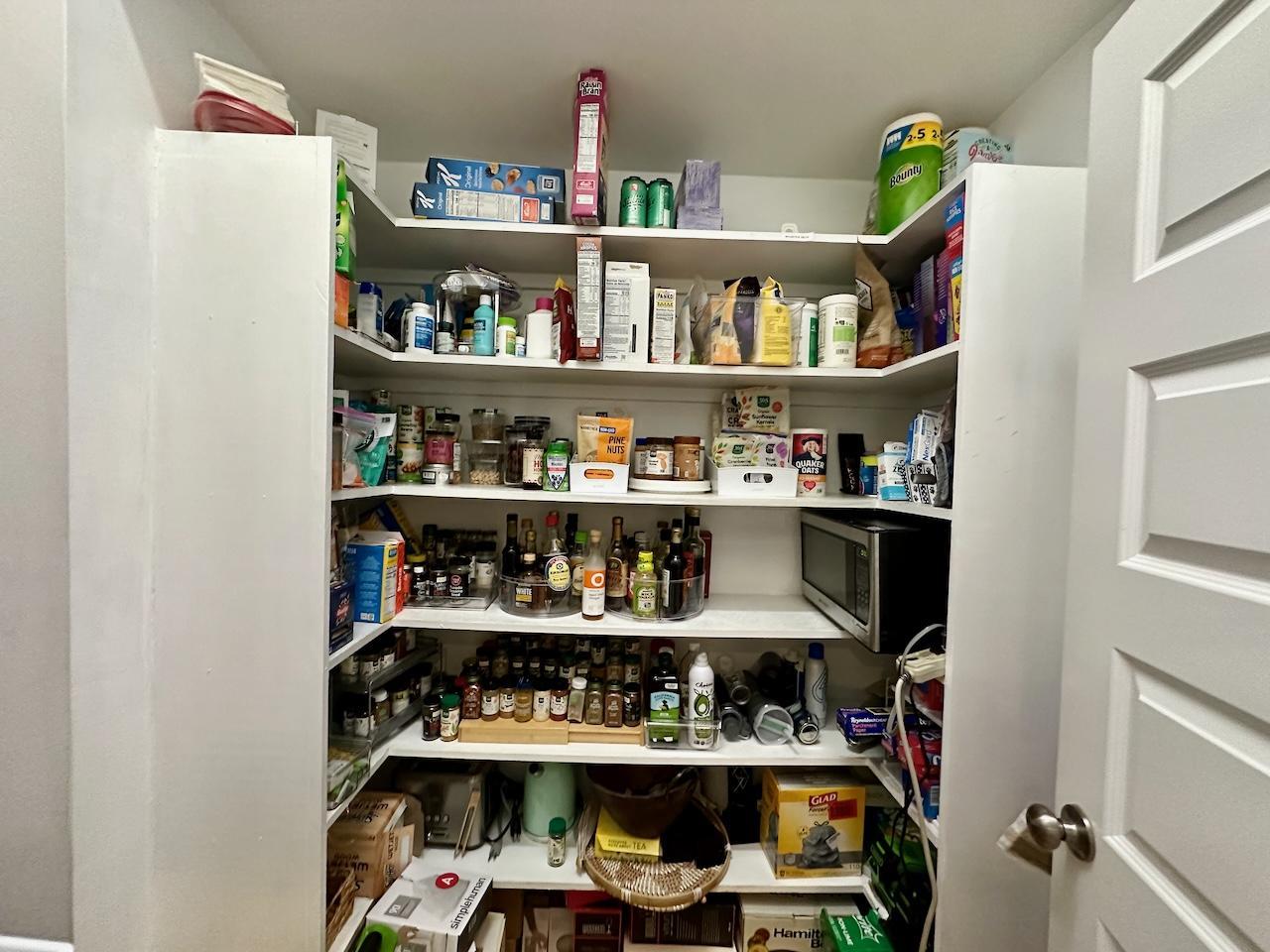 605 Elm Street Raleigh, NC 27604 - Photo 11 of 23 a room with wine cabinets and a book shelf