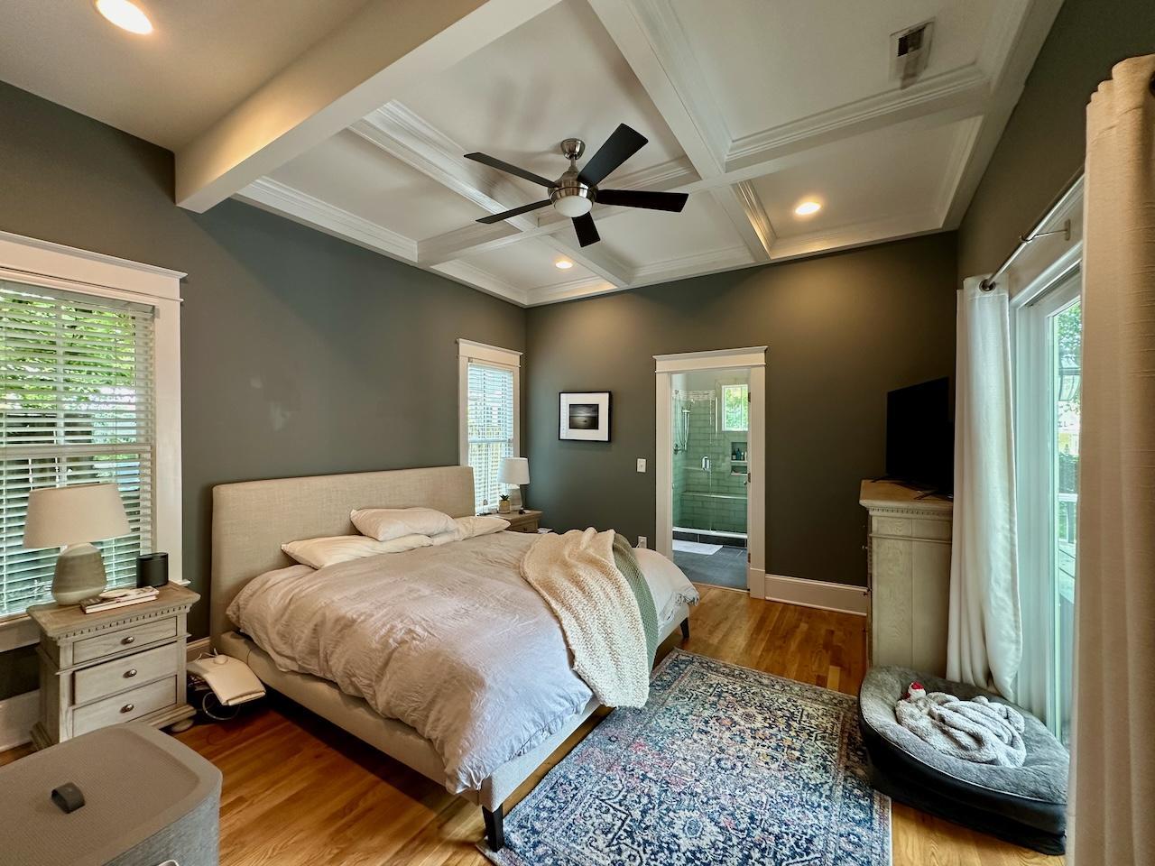 605 Elm Street Raleigh, NC 27604 - Photo 12 of 23 a bedroom with a bed and a couch