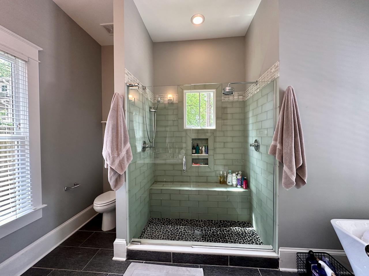 605 Elm Street Raleigh, NC 27604 - Photo 15 of 23 a bathroom with a toilet and a shower
