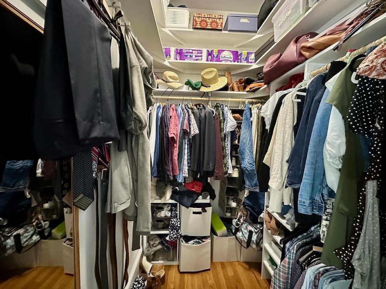 605 Elm Street Raleigh, NC 27604 - Photo 16 of 23 a view of walk in closet with clothes and shoes