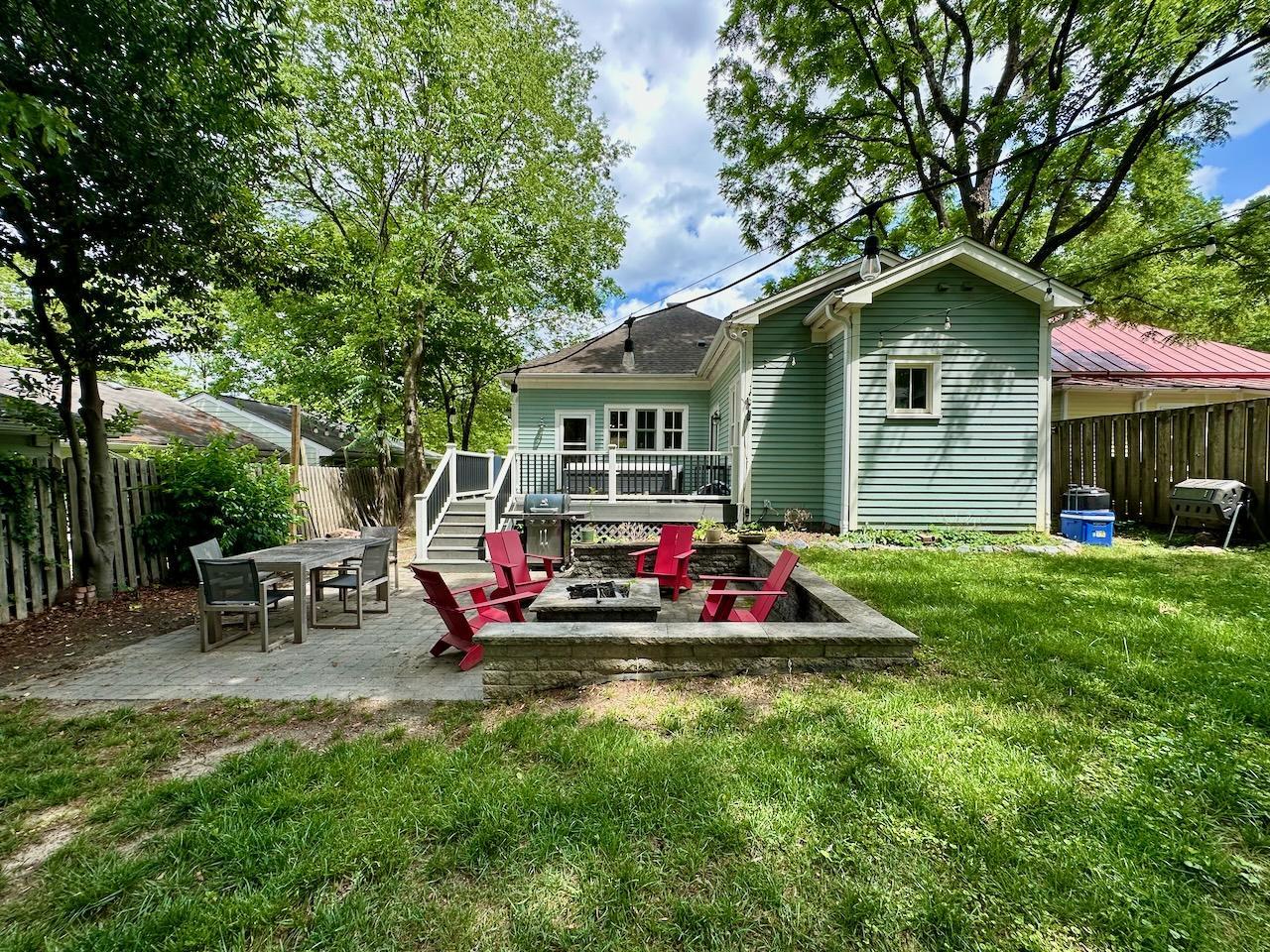 605 Elm Street Raleigh, NC 27604 - Photo 23 of 23 a view of house with backyard and outdoor seating