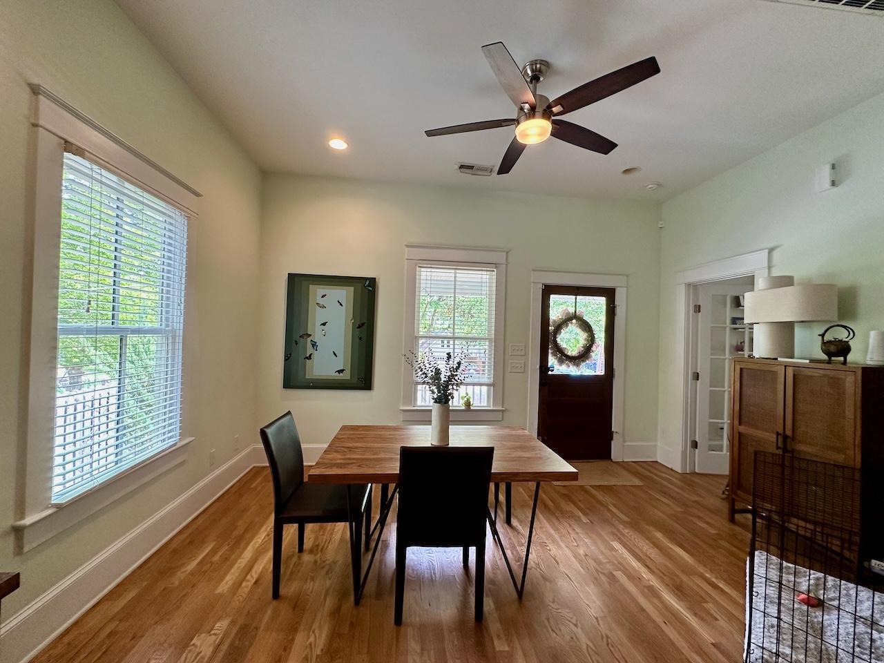 605 Elm Street Raleigh, NC 27604 - Photo 4 of 23 a view of a dining room with furniture window and wooden floor