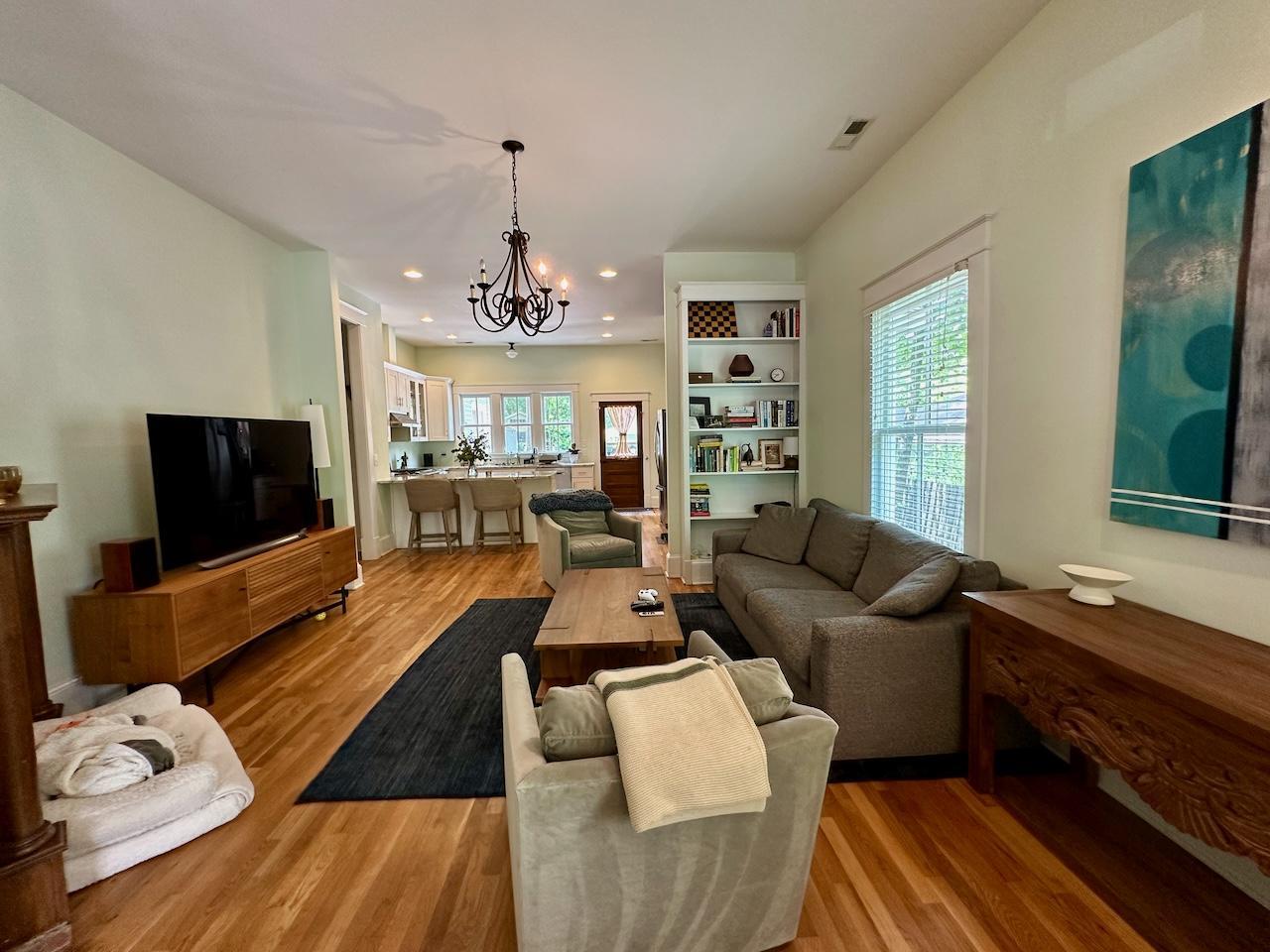 605 Elm Street Raleigh, NC 27604 - Photo 7 of 23 a living room with furniture fireplace and flat screen tv