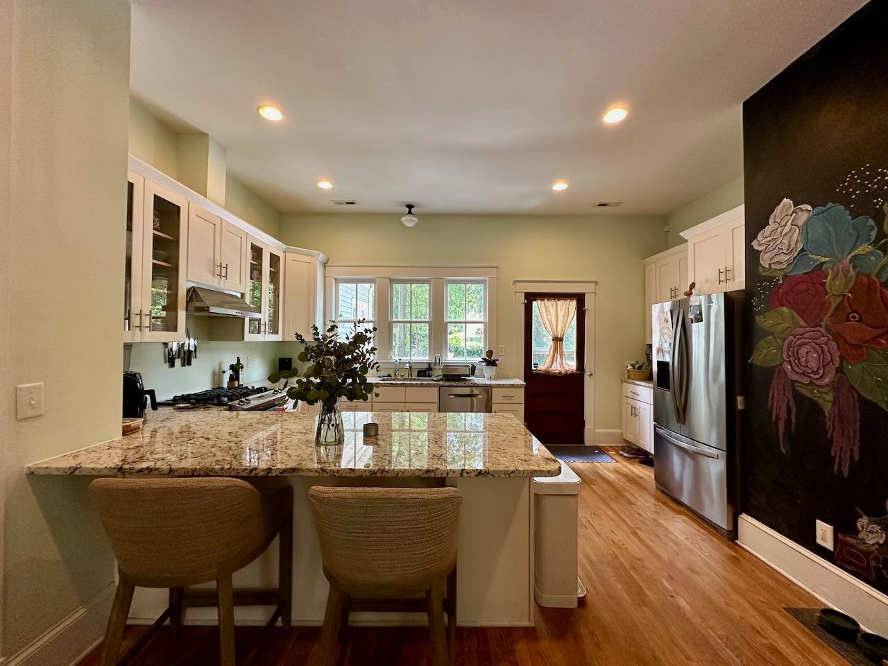 605 Elm Street Raleigh, NC 27604 - Photo 8 of 23 a view of a dining room with furniture