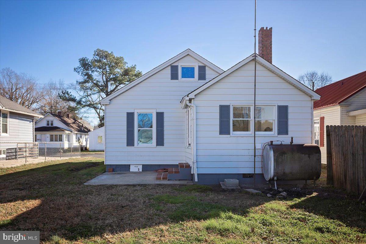 409 Oakley Street Cambridge, MD 21613 - Photo 12 of 12 a view of house with a yard