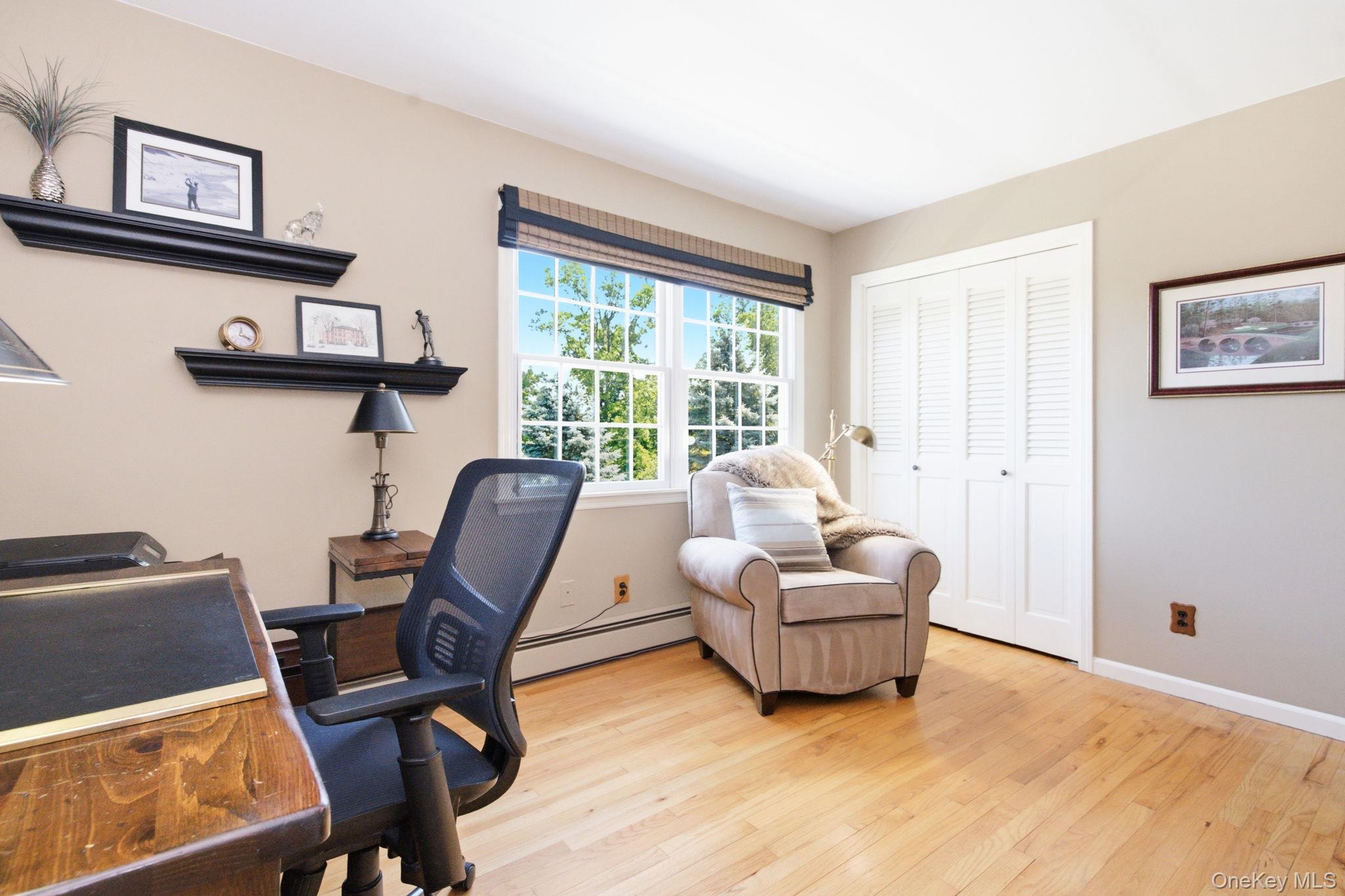 32 Bedell Road Katonah, NY 10536 - Photo 23 of 49 This bedroom offers hardwood floors, a double closet, and abundant natural light.
