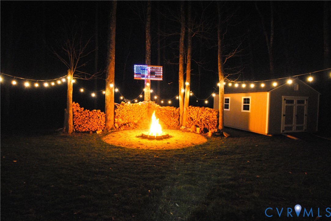 722 Signboard Road Bumpass, VA 23024 - Photo 59 of 65 Fire pit at night