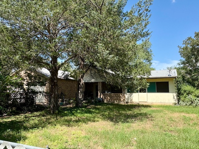 133 Old Firetower Road Bastrop, TX 78602 - Photo 1 of 1 a view of house with yard