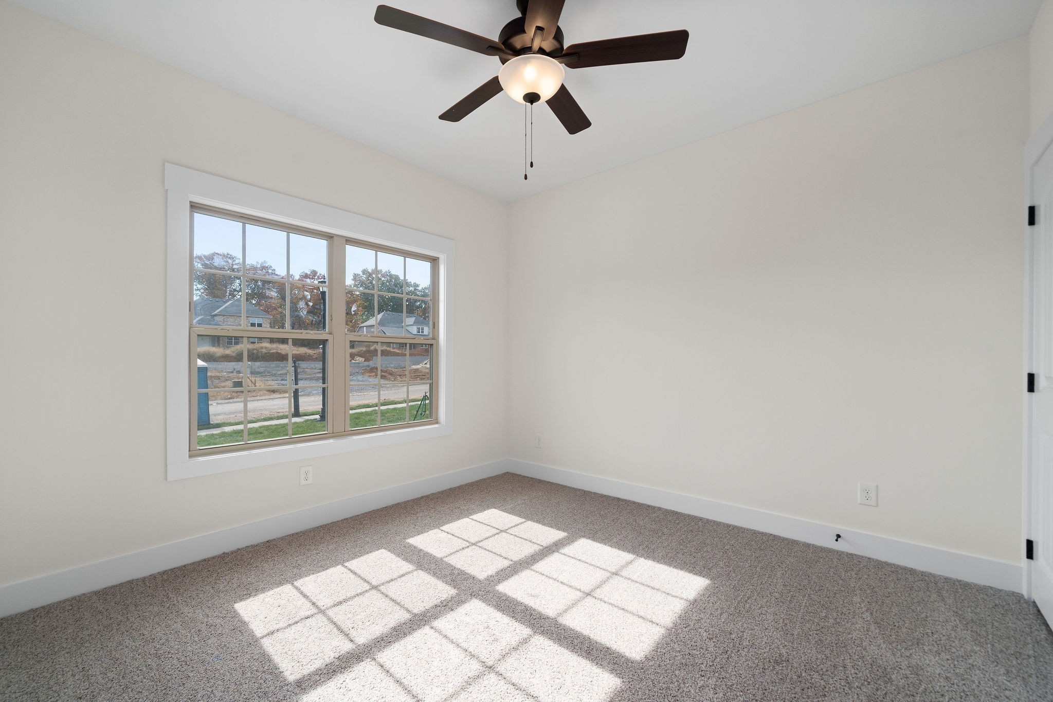 189 Dewberry Road Clarksville, TN 37042 - Photo 25 of 52 an empty room with windows and fan