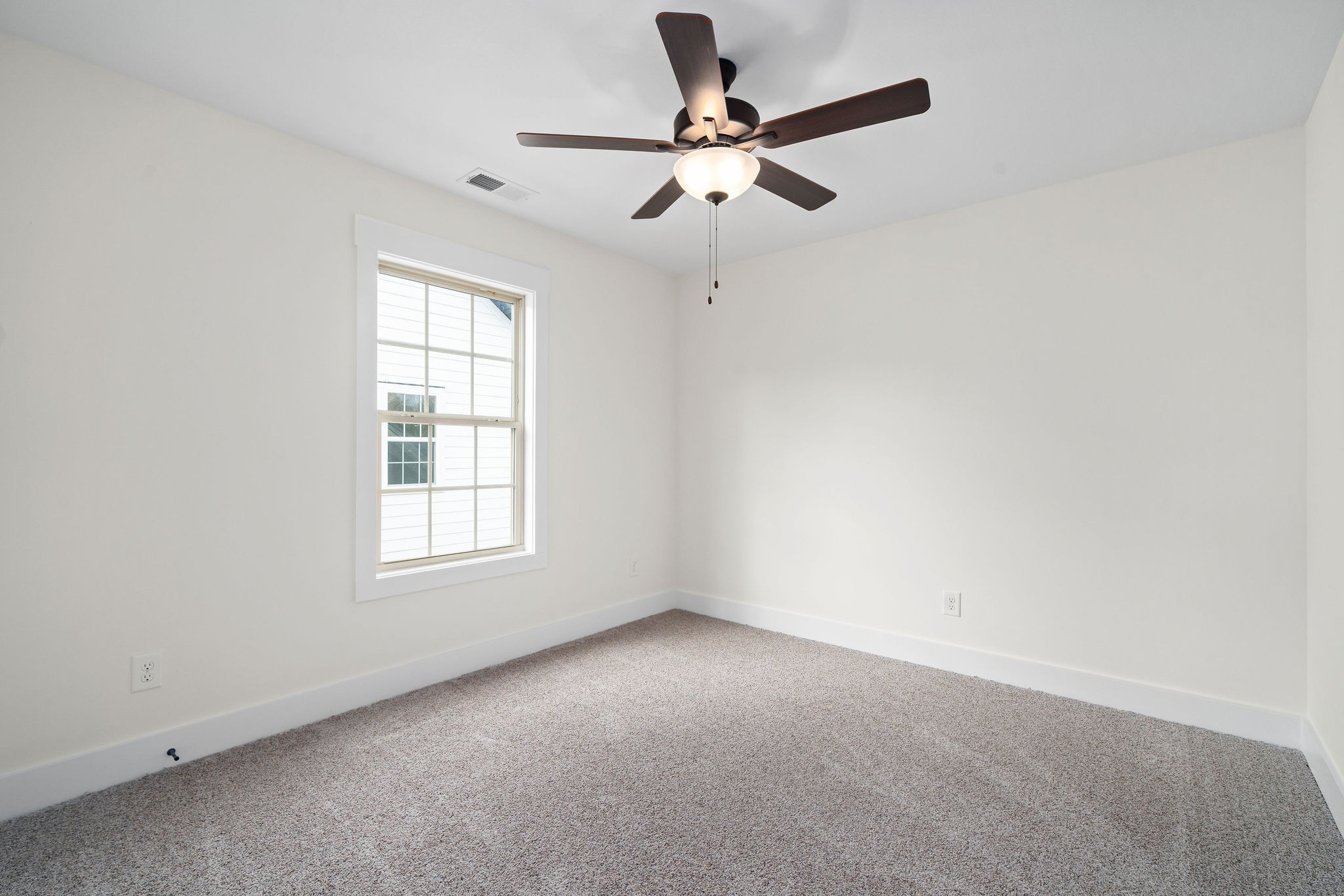 189 Dewberry Road Clarksville, TN 37042 - Photo 42 of 52 an empty room with a window and a fan