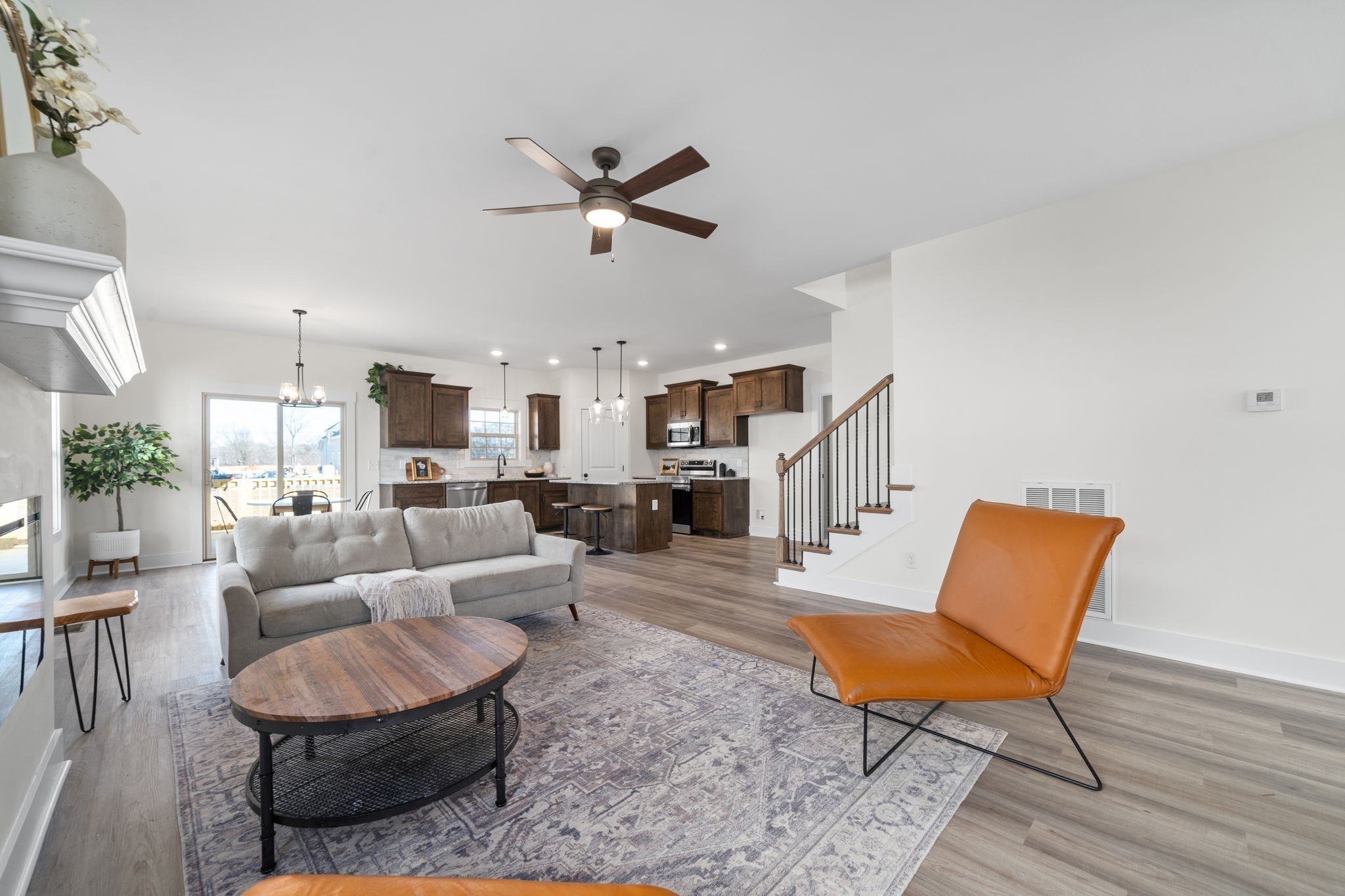 189 Dewberry Road Clarksville, TN 37042 - Photo 8 of 52 a living room with furniture and a wooden floor