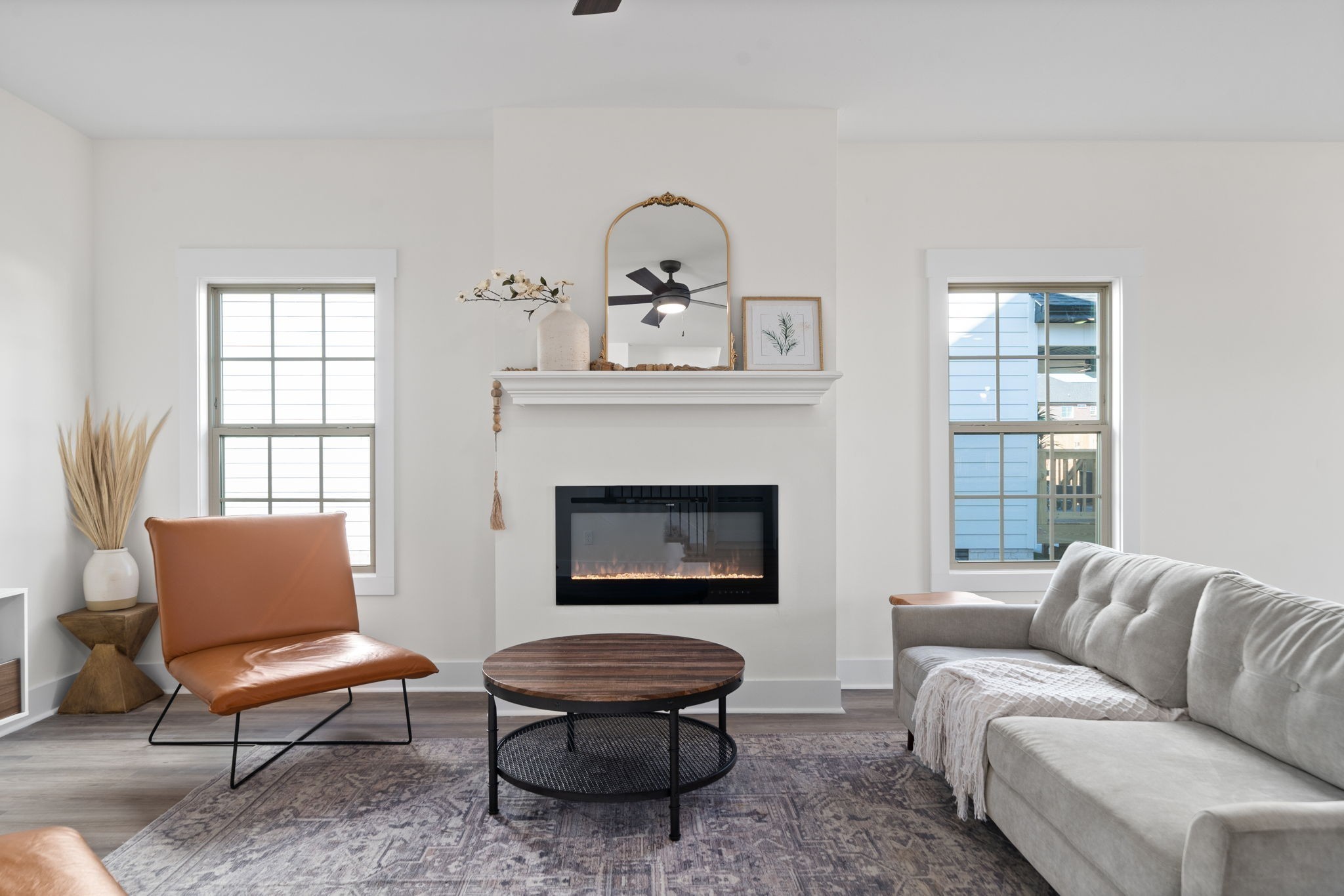 189 Dewberry Road Clarksville, TN 37042 - Photo 10 of 52 a living room with furniture a rug and a fireplace