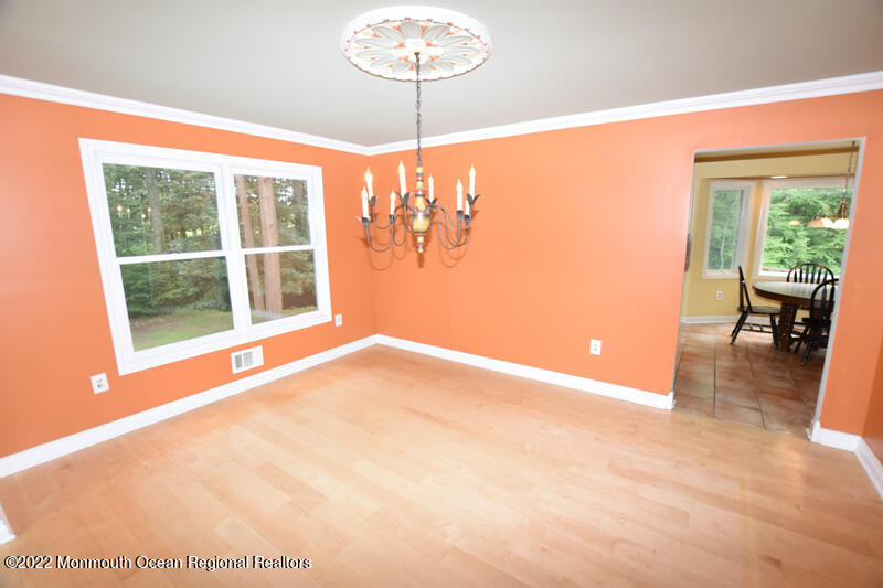 84 Daum Road Manalapan, NJ 07726 - Photo 12 of 50 a view of an empty room with a window