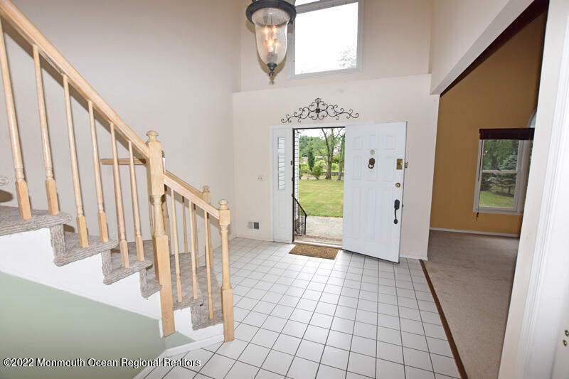 84 Daum Road Manalapan, NJ 07726 - Photo 2 of 50 a view of an entryway with wooden floor