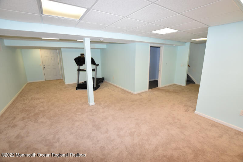 84 Daum Road Manalapan, NJ 07726 - Photo 39 of 50 a view of a livingroom with a staircase