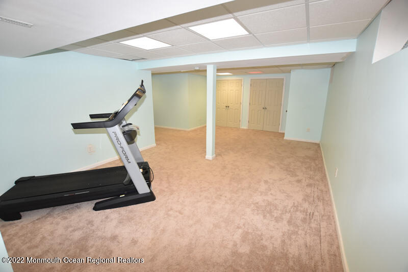 84 Daum Road Manalapan, NJ 07726 - Photo 40 of 50 a view of a room with gym equipment