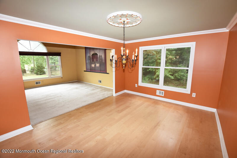 84 Daum Road Manalapan, NJ 07726 - Photo 9 of 50 a view of an empty room with a window