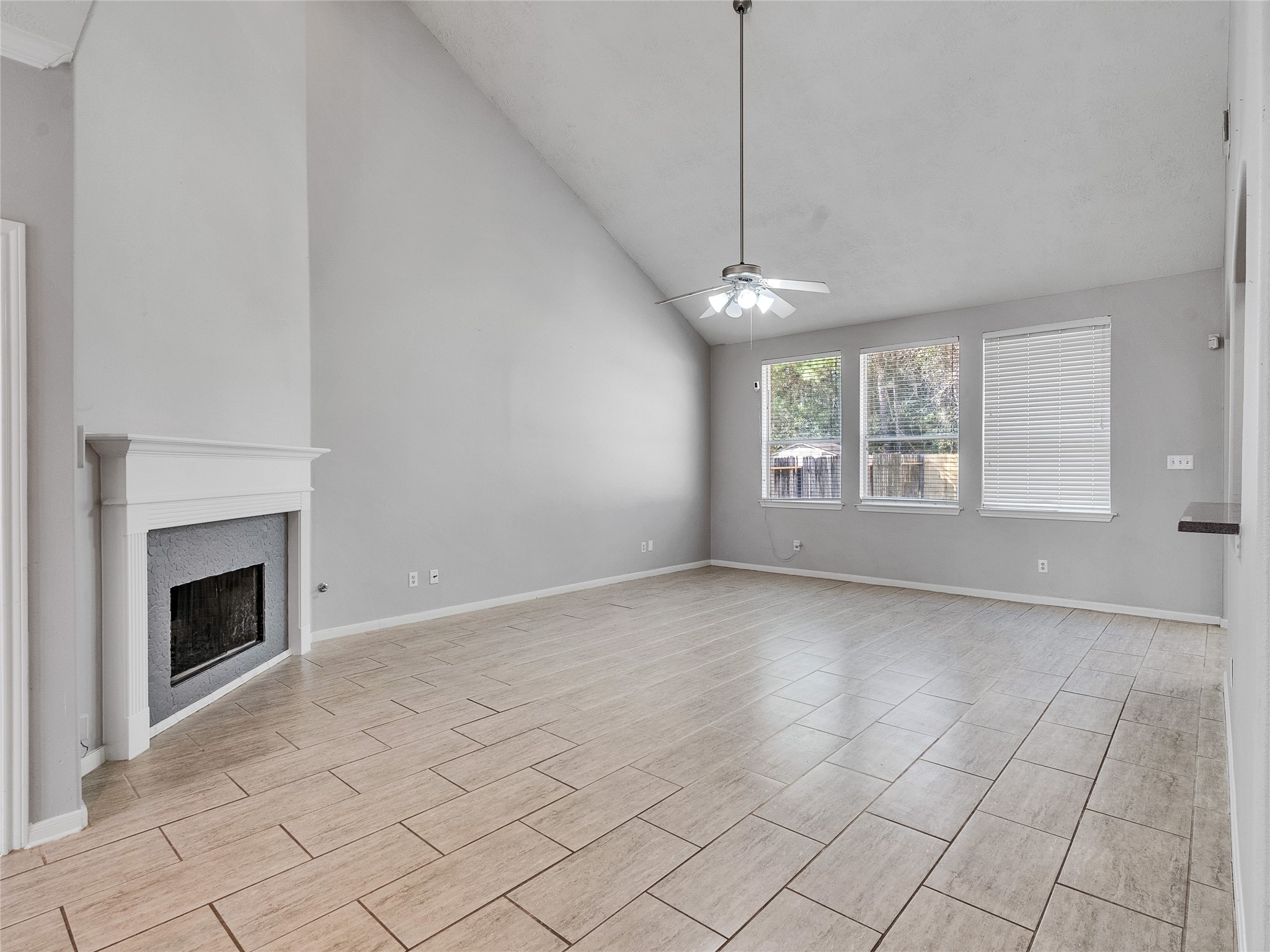 2615 Fern Lacy Drive Spring, TX 77388 - Photo 10 of 33 Another view of the living room and the chimney with its fresh coat of paint