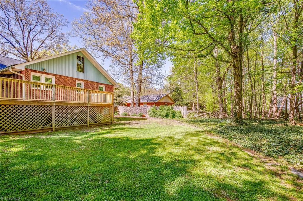 213 Ransom Road Winston-Salem, NC 27106 - Photo 22 of 25 Large backyard with natural areas