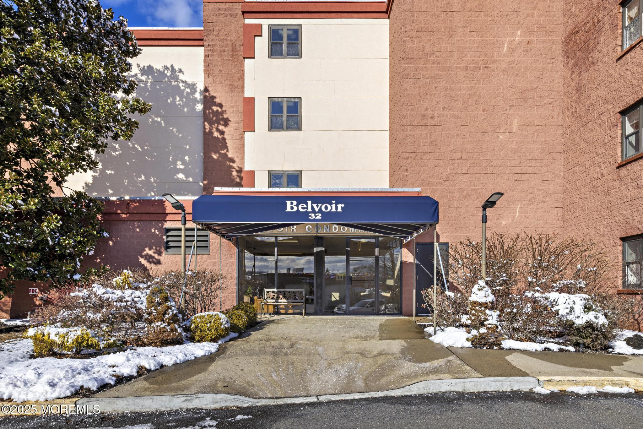 32 Center Avenue, Unit 17 Atlantic Highlands, NJ 07716 - Photo 23 of 27 a view of a house with a patio