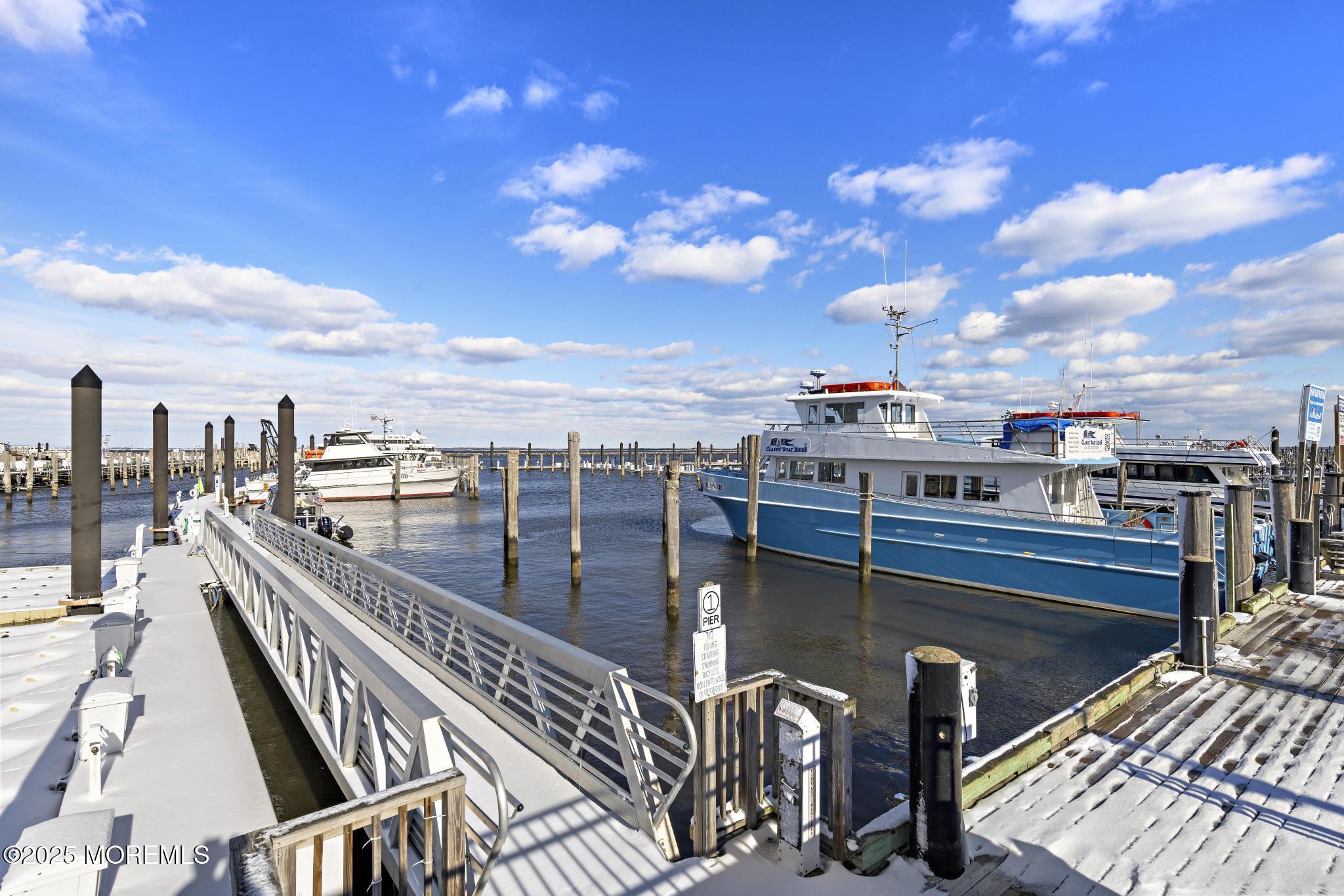 32 Center Avenue, Unit 17 Atlantic Highlands, NJ 07716 - Photo 26 of 27 a view of a balcony with wooden floor