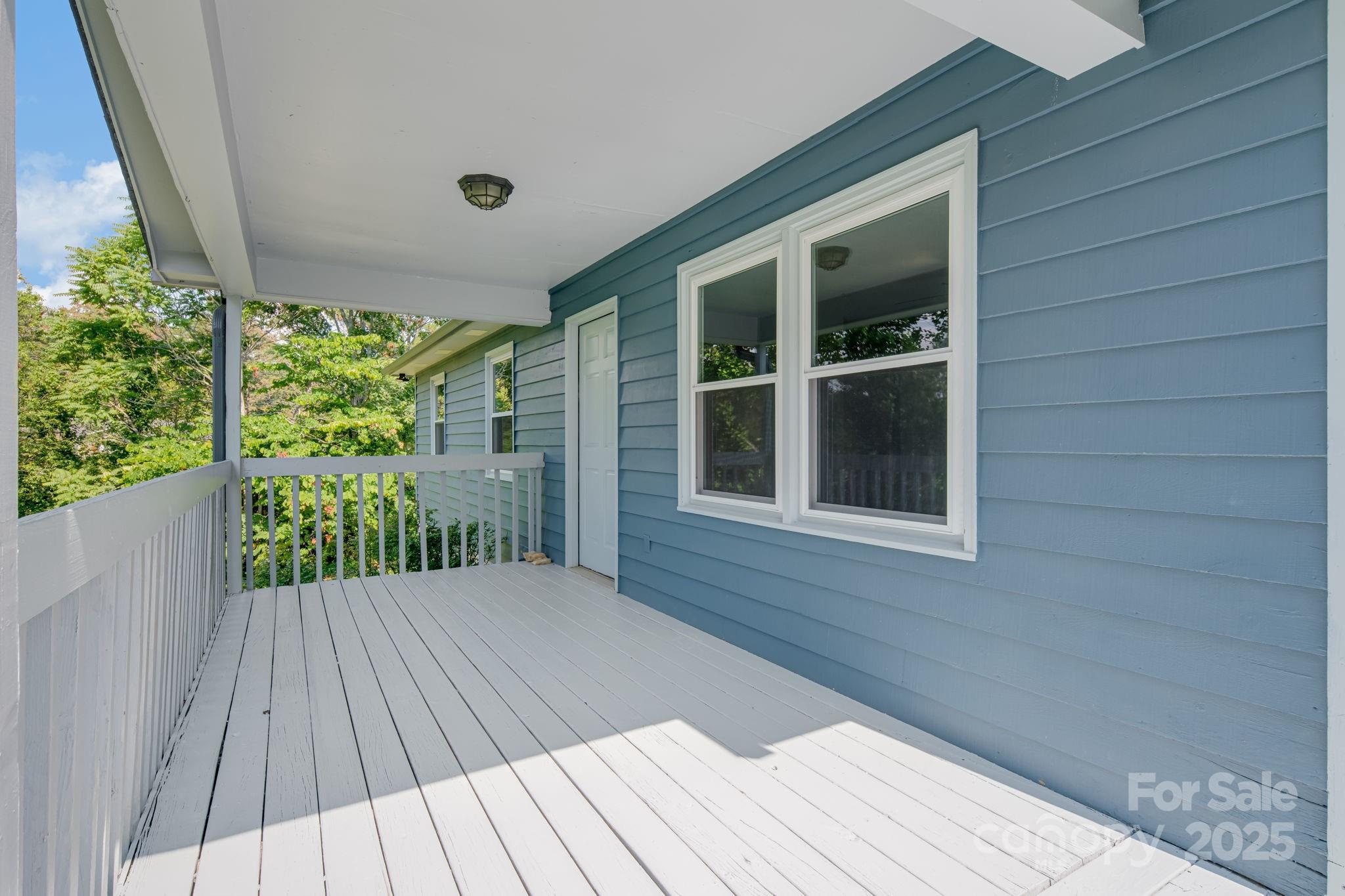 1360 Jupiter Road Weaverville, NC 28787 - Photo 16 of 39 a front view of a house with a porch