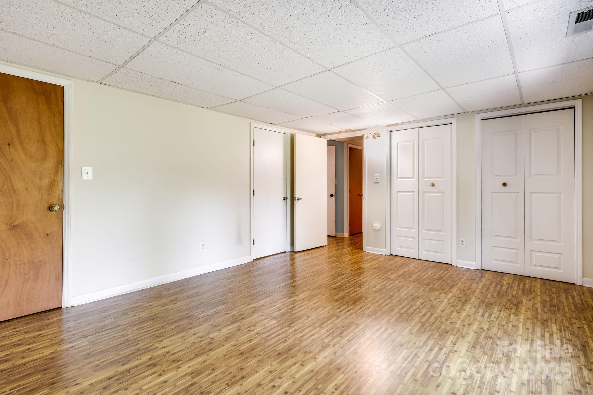 1360 Jupiter Road Weaverville, NC 28787 - Photo 24 of 39 a view of empty room with wooden floor