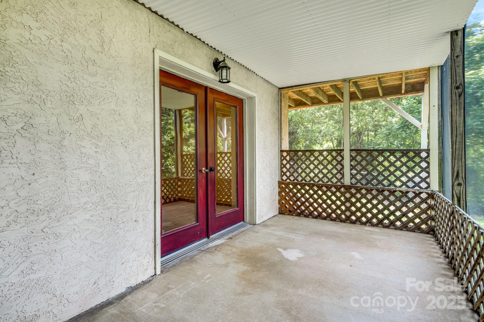 1360 Jupiter Road Weaverville, NC 28787 - Photo 27 of 39 a view of a room with wooden floor and outdoor space