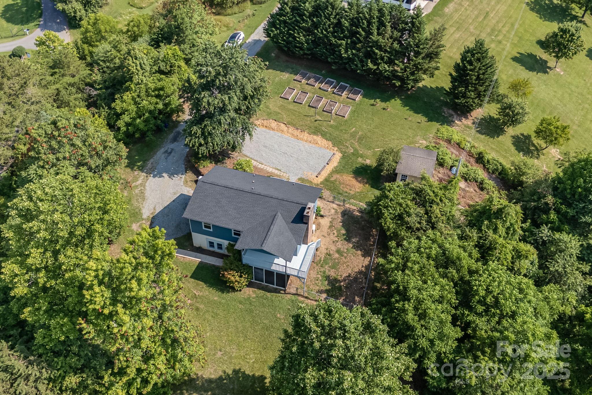 1360 Jupiter Road Weaverville, NC 28787 - Photo 37 of 39 an aerial view of a house with yard swimming pool and outdoor seating