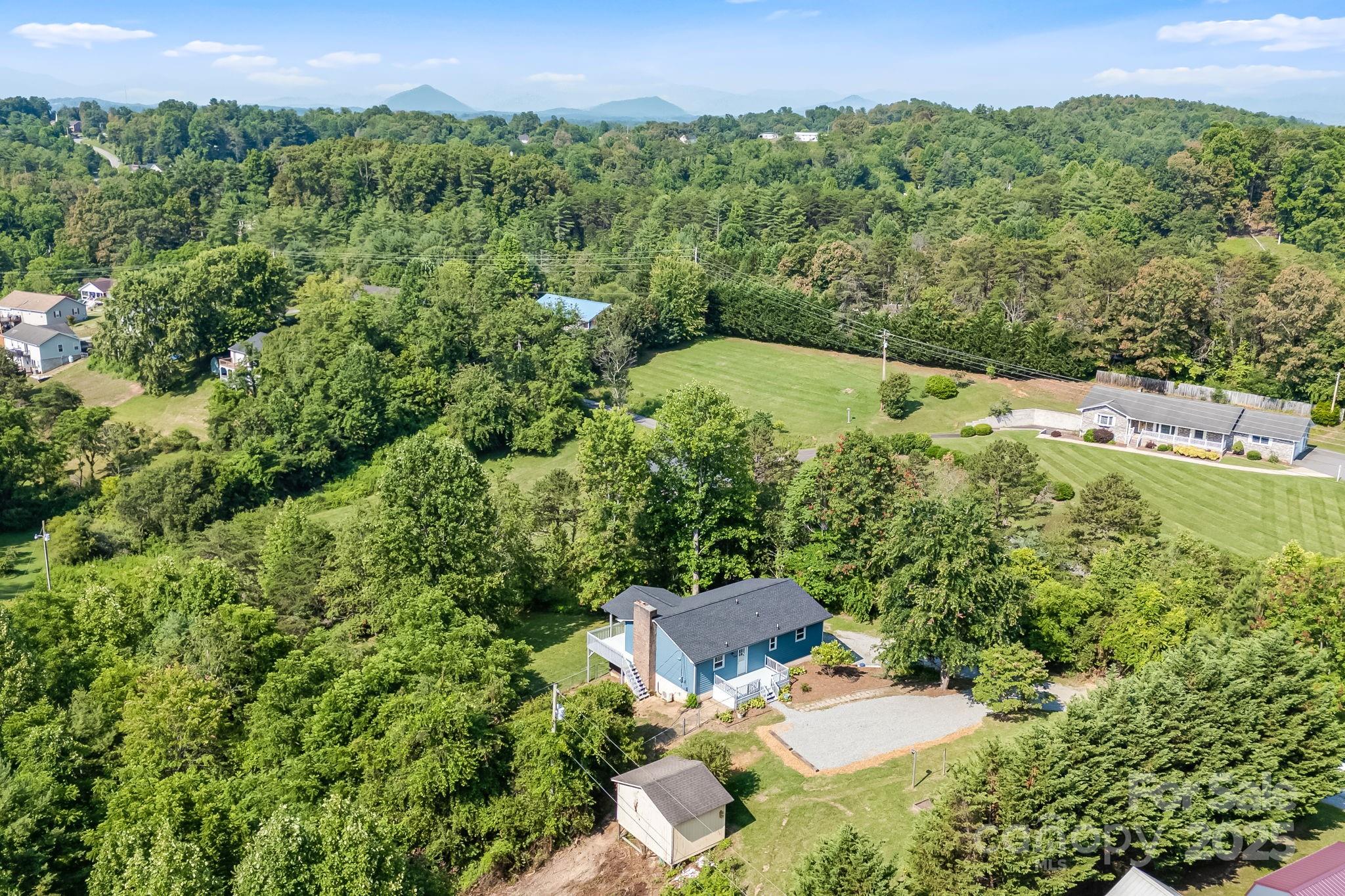 1360 Jupiter Road Weaverville, NC 28787 - Photo 38 of 39 an aerial view of a house with a yard