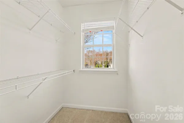 a view of small space with racks on the wall