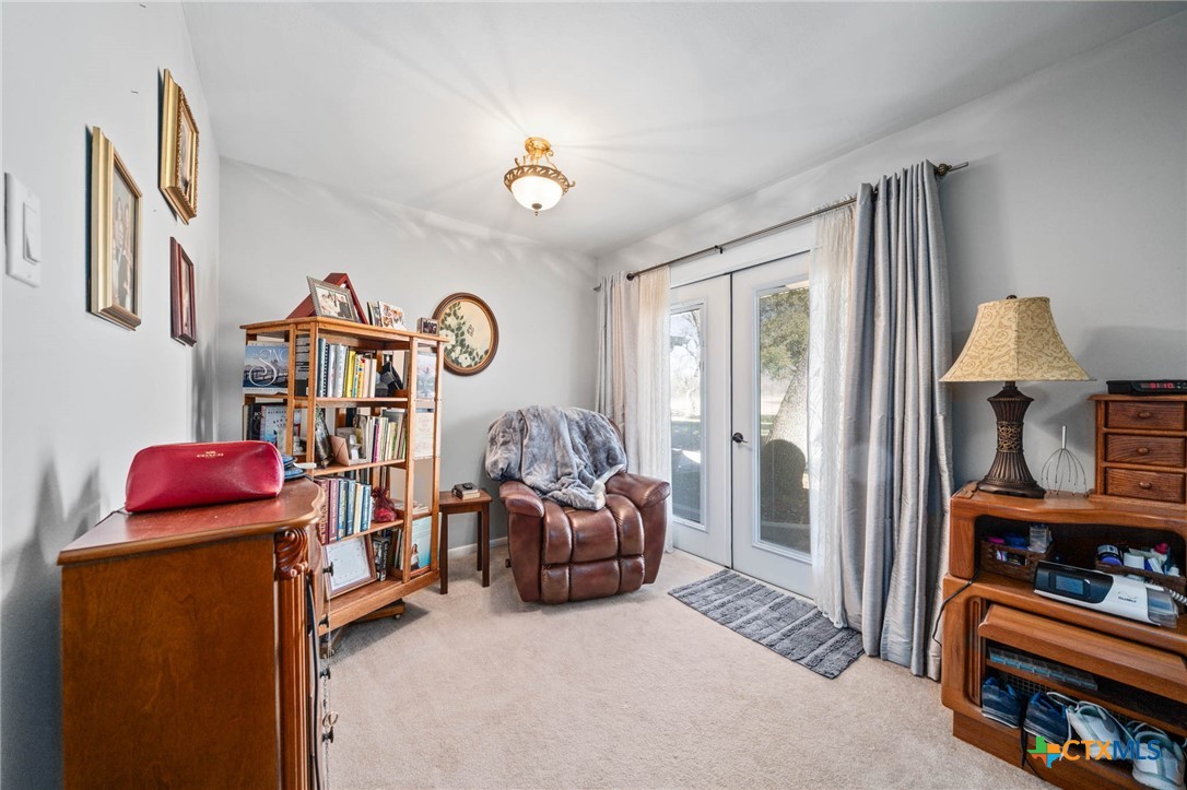 2443 Highway 36 Cameron, TX 76520 - Photo 12 of 34 a livingroom with furniture and a flat screen tv
