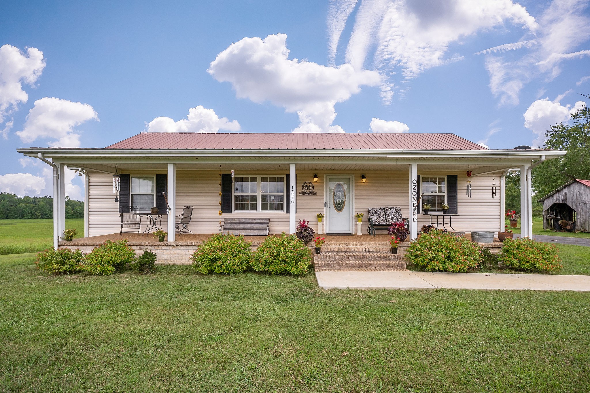 126 Ozone Road Monroe, TN 38573 - Photo 2 of 40 front view of a house with a yard