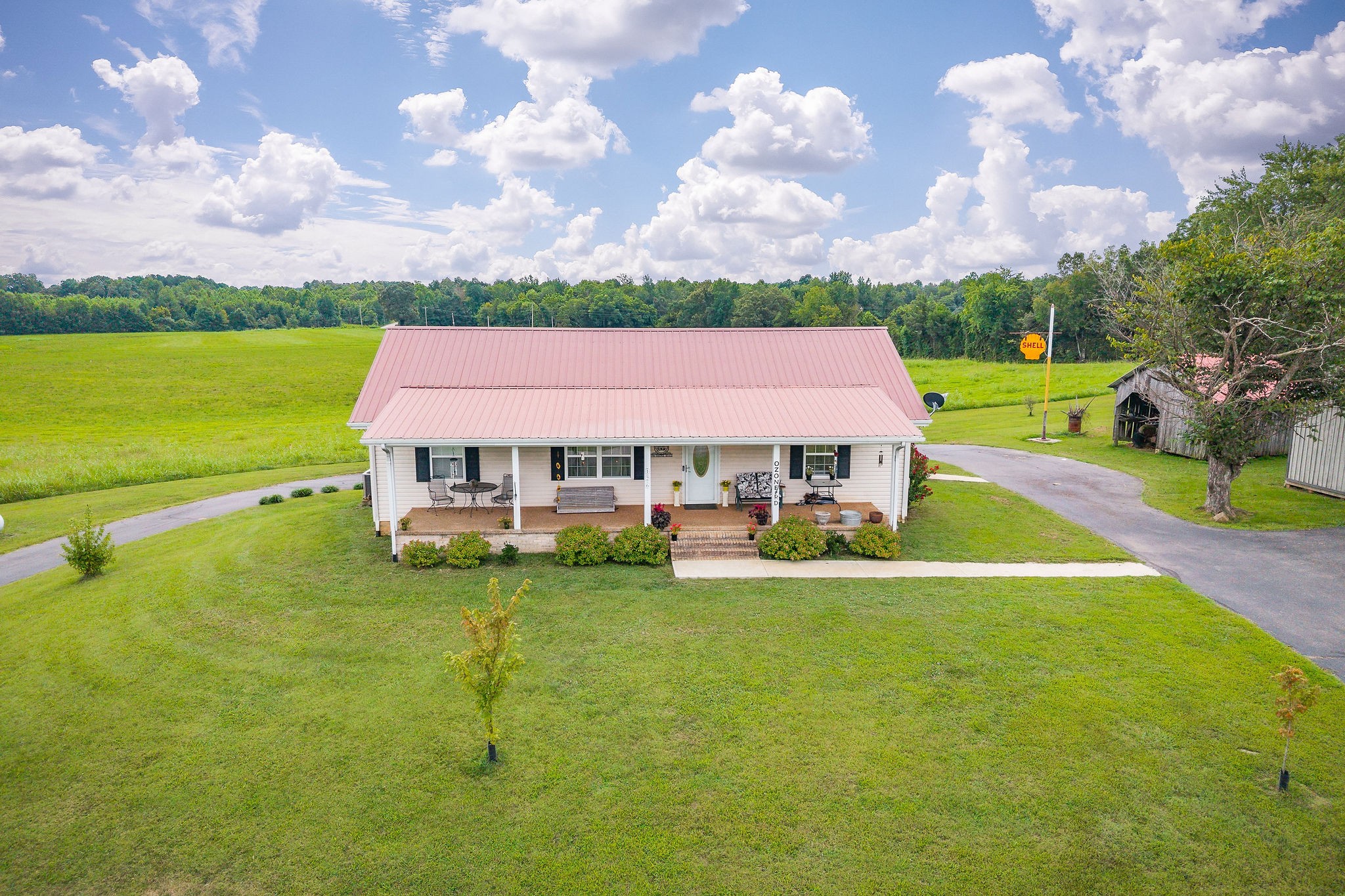 126 Ozone Road Monroe, TN 38573 - Photo 3 of 40 a view of a house with a big yard