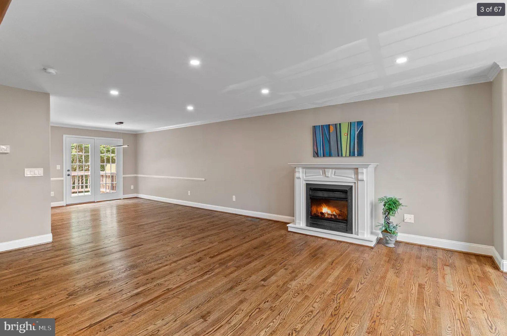 3906 Valley Ridge Drive Fairfax, VA 22033 - Photo 3 of 58 Spacious living area with cozy fireplace.
