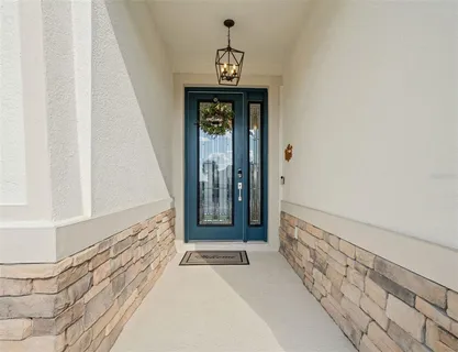a view of entryway with a front door