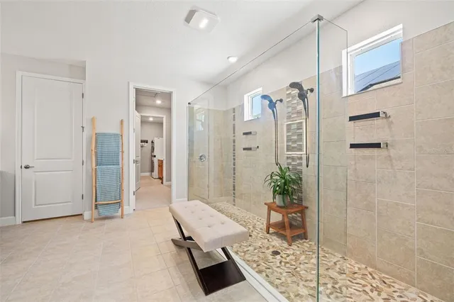 a view of a livingroom with furniture and a window