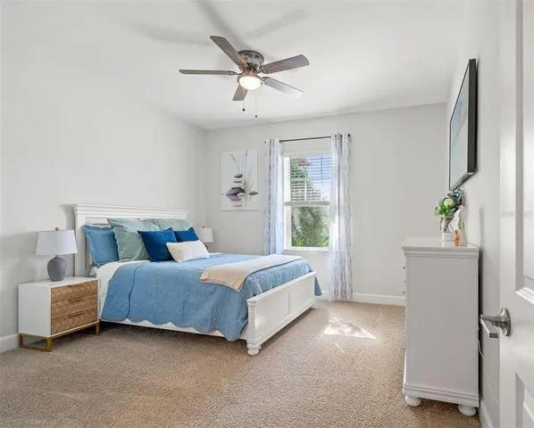 an aerial view of a house with a swimming pool