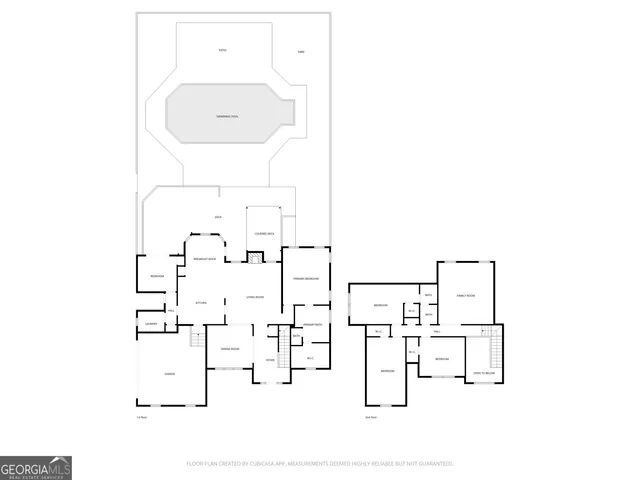 an aerial view of a house with a yard and garden
