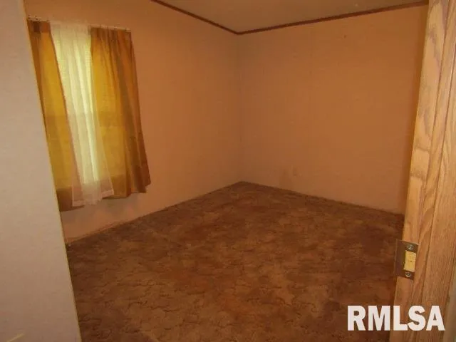 an empty room with a door