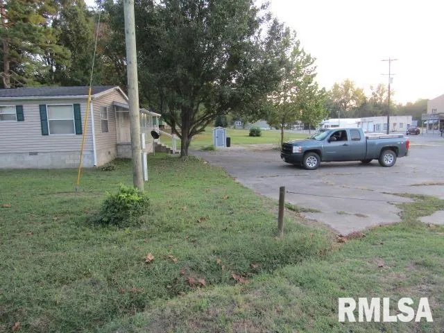 a view of car parked in front of house