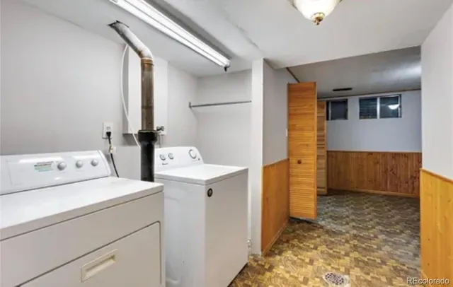 a utility room with dryer and washer