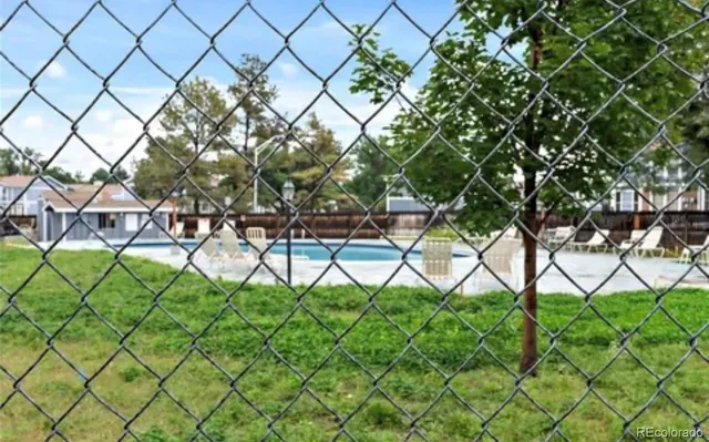 a view of a yard and a signage
