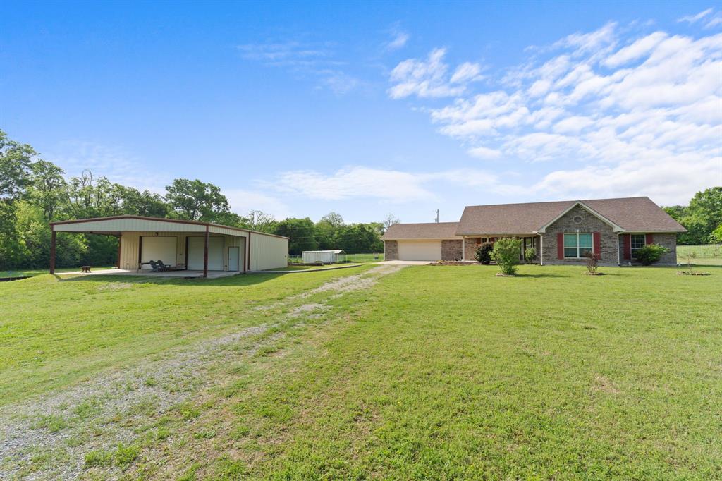 254 Jackson Road Whitewright, TX 75491 - Photo 11 of 40 Front view of home and workshop
