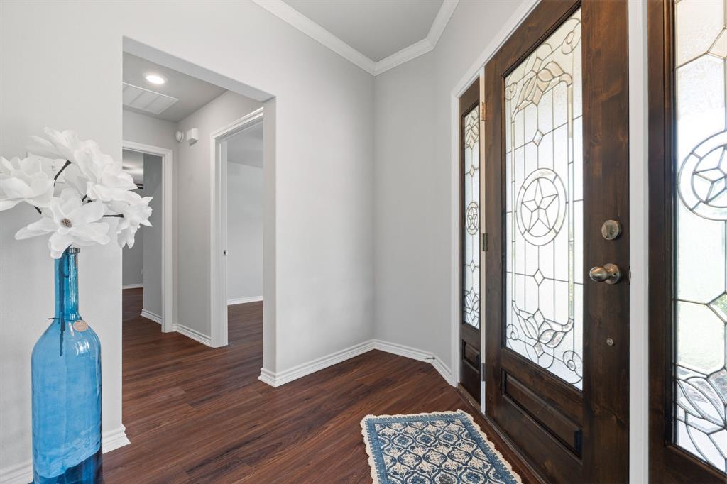 254 Jackson Road Whitewright, TX 75491 - Photo 17 of 40 Foyer and leaded glass door and windows
