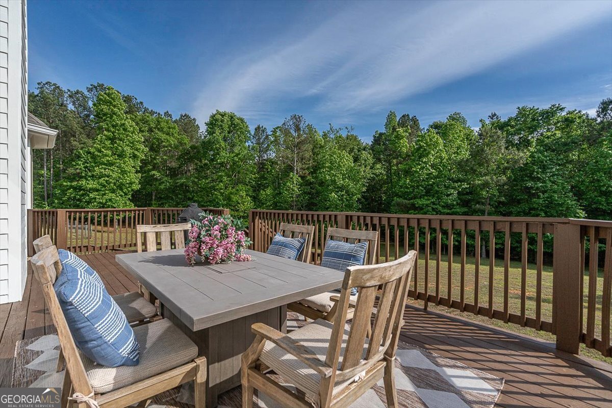 3093 Surry Ridge Drive Watkinsville, GA 30677 - Photo 32 of 41 a view of a deck with furniture