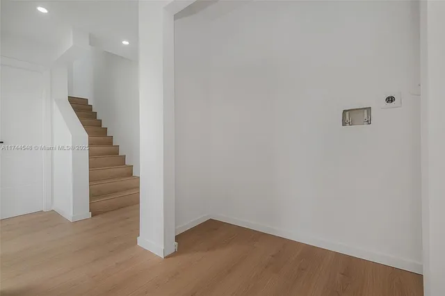 a view of entryway with stairs