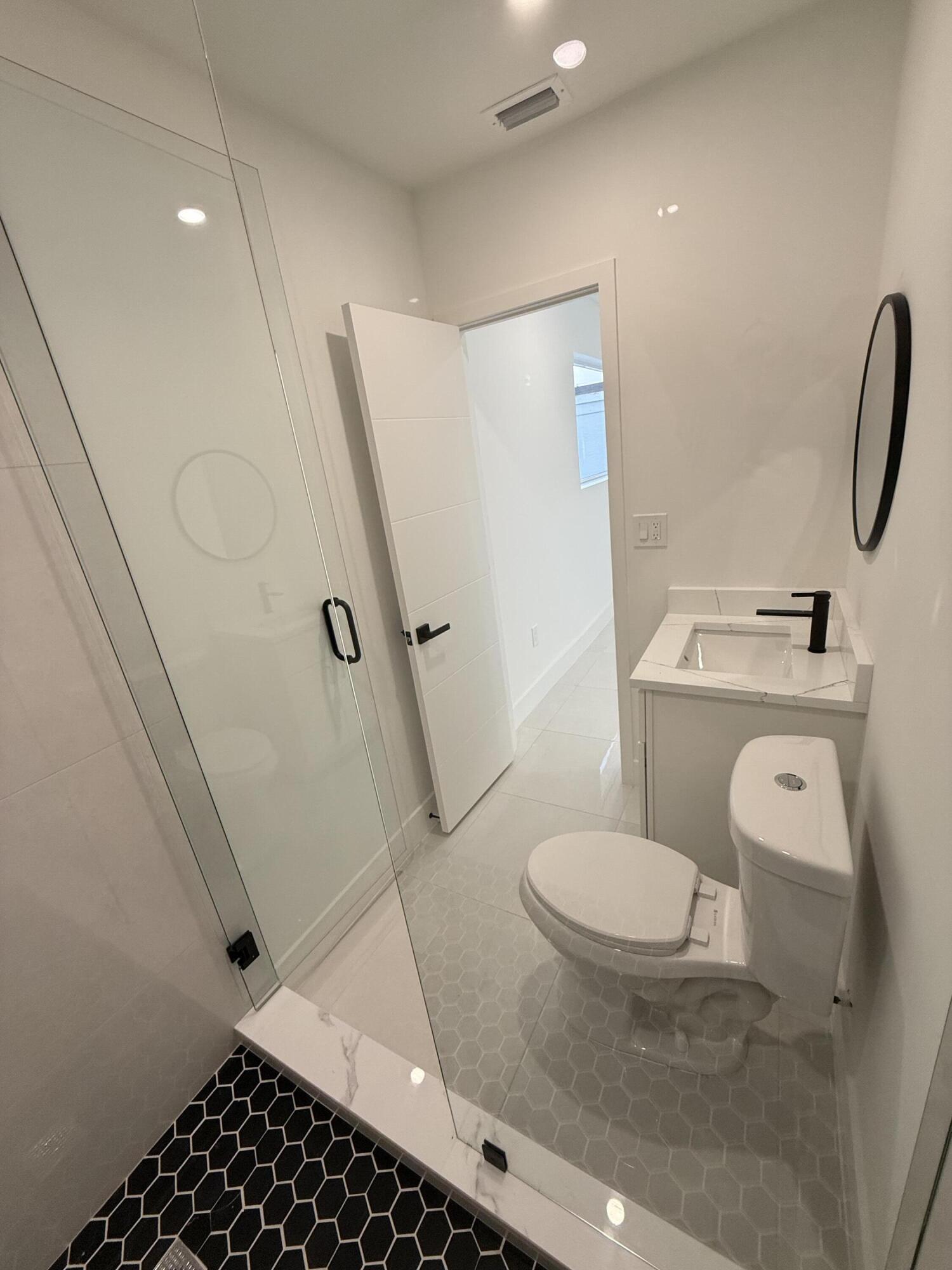 345 Pinehurst Road Palm Springs, FL 33461 - Photo 29 of 38 master bathrroom 1 (1)