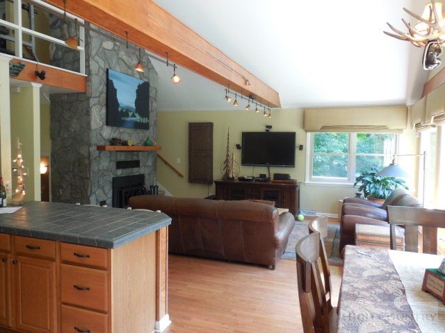 378 Howard's Creek Road Boone, NC 28607 - Photo 7 of 35 a living room with furniture and a flat screen tv